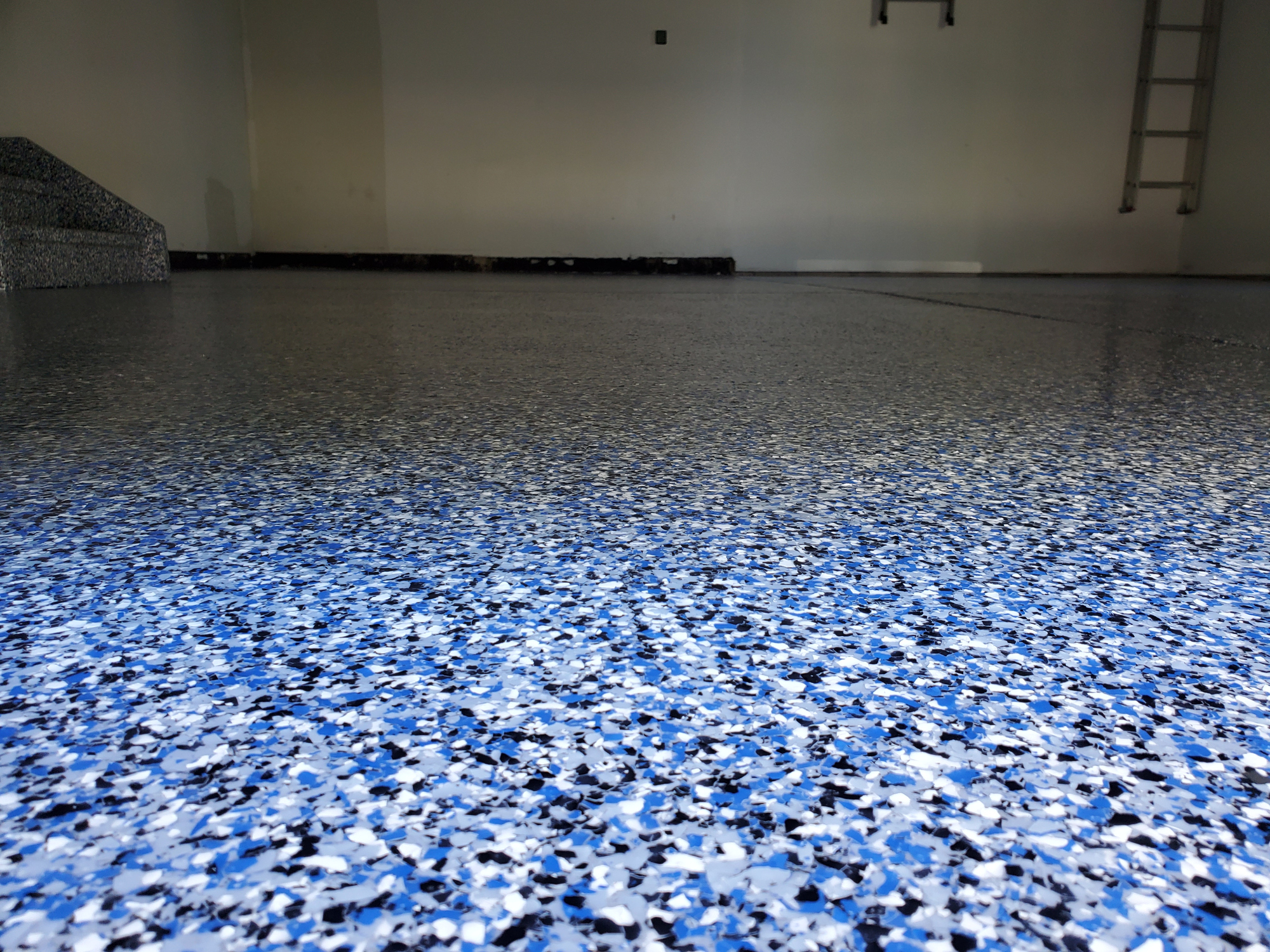 Stunning blue metallic designer epoxy floor with 3D effects