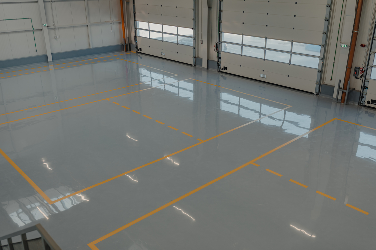 Luxury garage with metallic epoxy and sports car